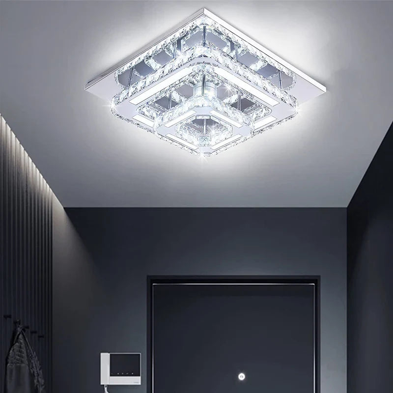 https://cdn.shopify.com/s/files/1/2499/8120/files/plafonnier-led-suspendu-en-cristal-au-design-nordique-simpliste-et-moderne-0.png?v=1711288978