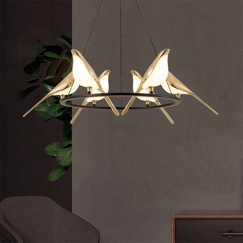 https://cdn.shopify.com/s/files/1/2499/8120/files/lustre-design-led-luxury-en-forme-doiseaux-dores-pie.jpg?v=1683905540