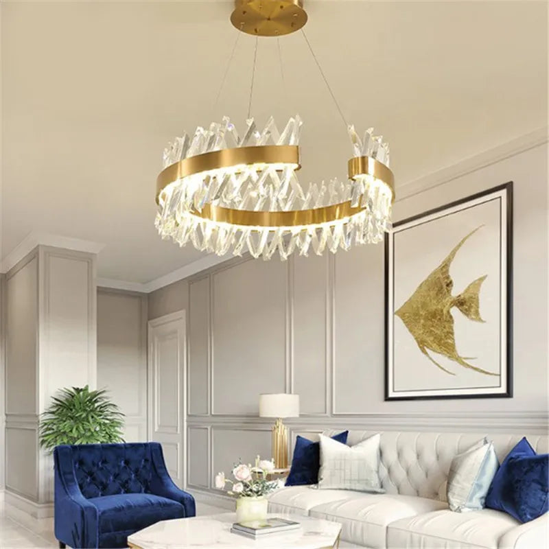 https://cdn.shopify.com/s/files/1/2499/8120/files/lustre-moderne-en-cristal-dor-clairage-led-design-l-gant-0.png?v=1728867060