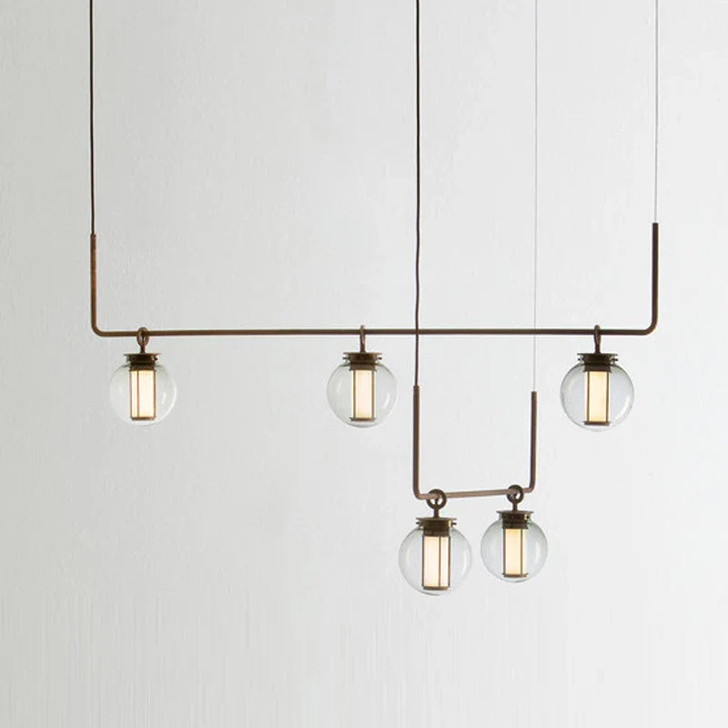 https://cdn.shopify.com/s/files/1/2499/8120/files/lustre-design-postmoderne-en-verre-et-m-tal-clairage-nordique-d-coratif-0.jpg?v=1725699171