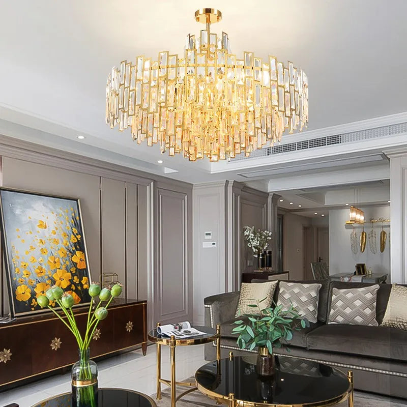 https://cdn.shopify.com/s/files/1/2499/8120/files/lustre-design-led-moderne-en-cristal-argent-et-dor-suspendu-0.png?v=1728204697