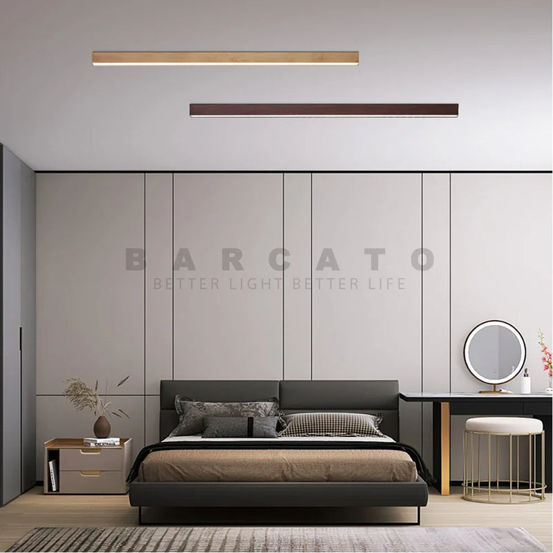 https://cdn.shopify.com/s/files/1/2499/8120/files/plafonnier-led-suspendu-longue-bande-design-moderne-clairage-lin-aire-0.png?v=1715605568