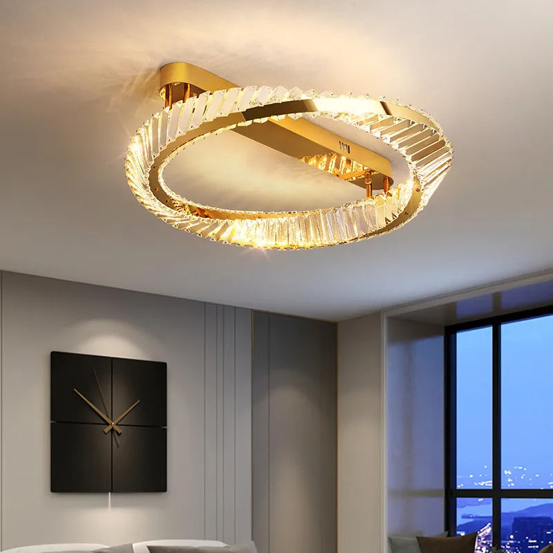 https://cdn.shopify.com/s/files/1/2499/8120/files/plafonnier-design-dor-moderne-avec-cristal-0.png?v=1704367017