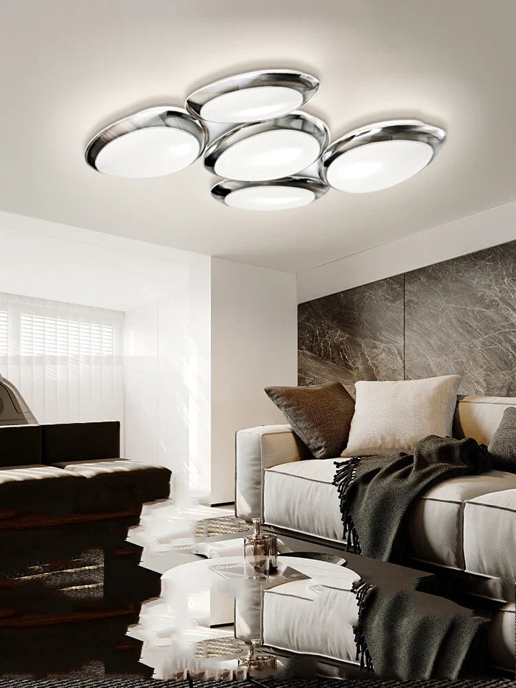 https://cdn.shopify.com/s/files/1/2499/8120/files/plafonnier-led-intelligent-design-moderne-forme-galets-2024-0.png?v=1720283653