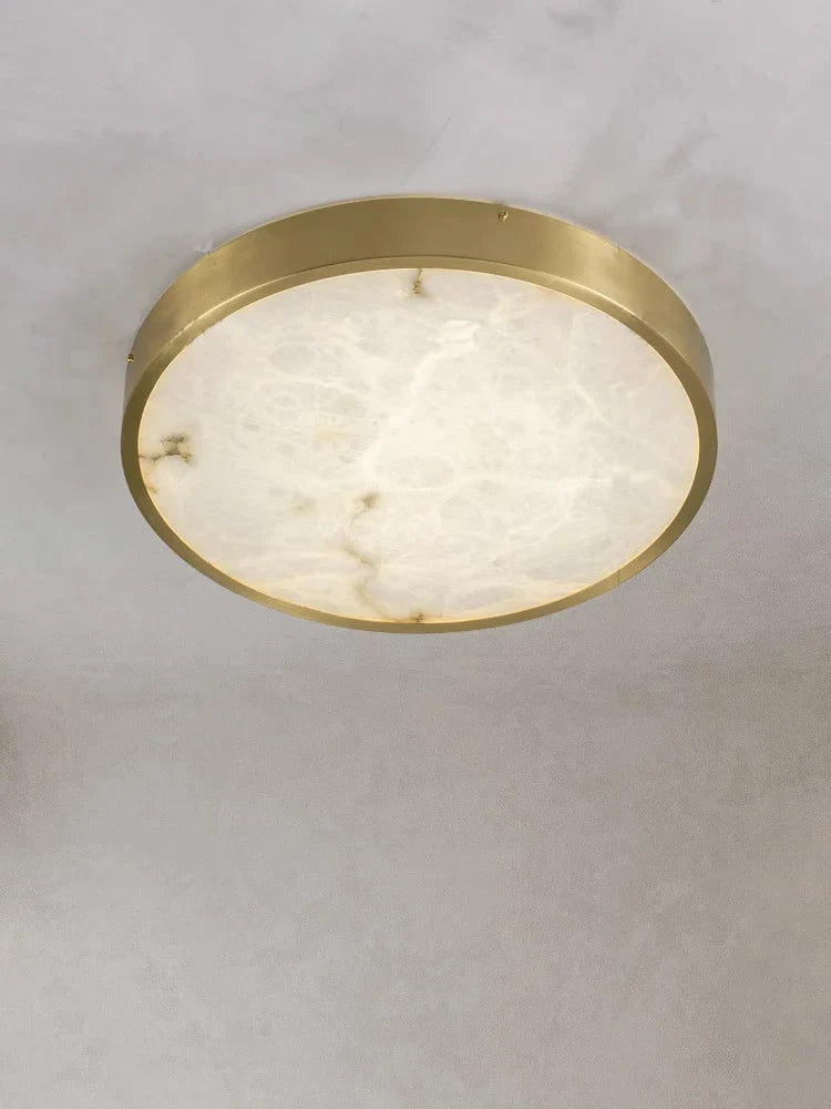 https://cdn.shopify.com/s/files/1/2499/8120/files/plafonnier-en-marbre-espagnol-design-moderne-et-luxueux-led-0.png?v=1733763164