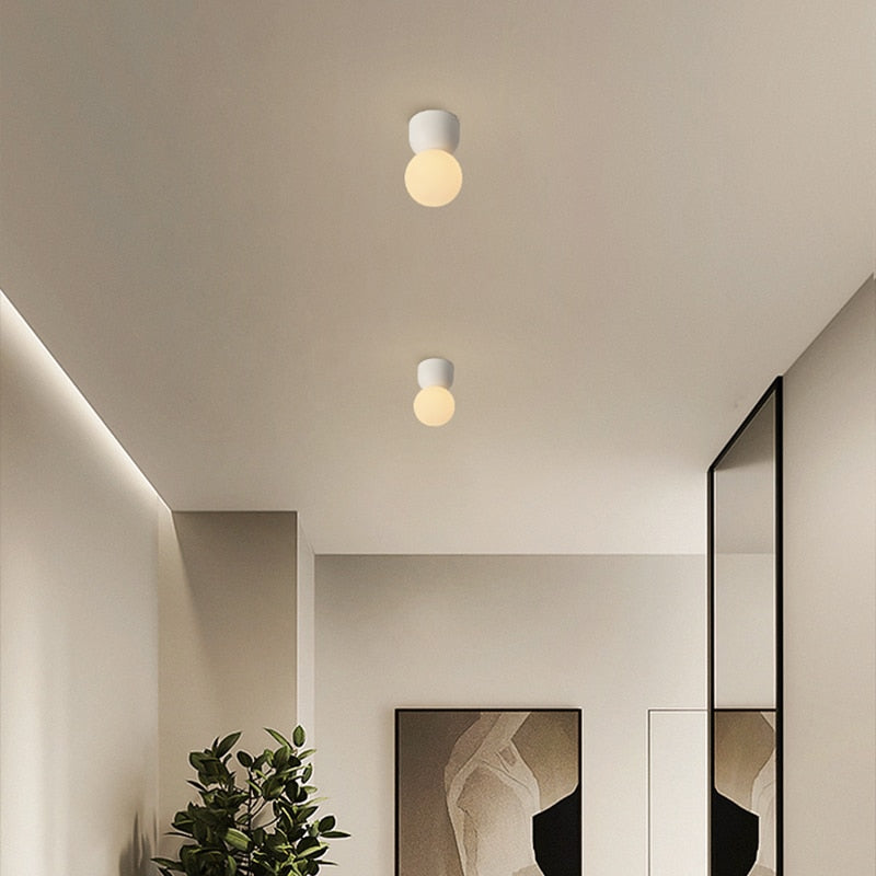 https://cdn.shopify.com/s/files/1/2499/8120/products/plafonnier-design-led-minimaliste-nordic.jpg?v=1678838953