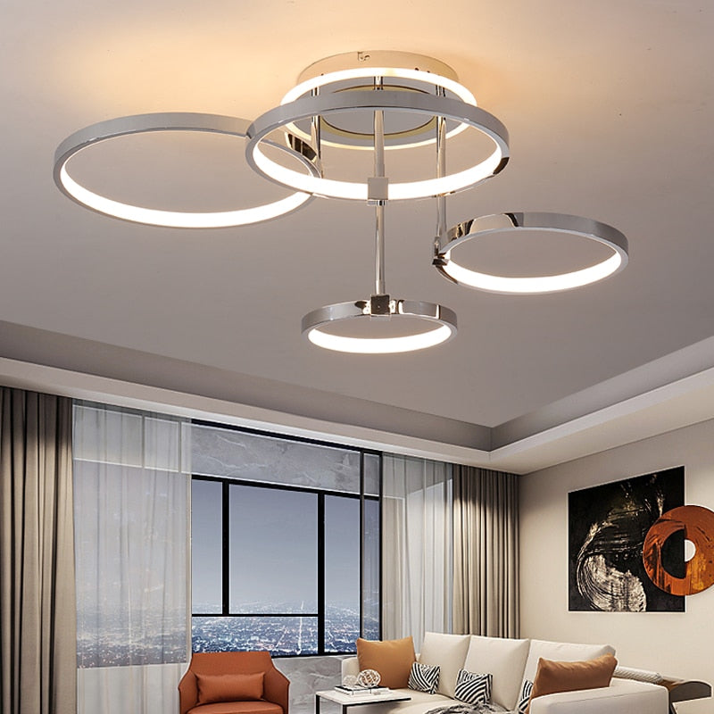 https://cdn.shopify.com/s/files/1/2499/8120/products/plafonnier-design-led-avec-anneaux-suspendus-xina.jpg?v=1668567663