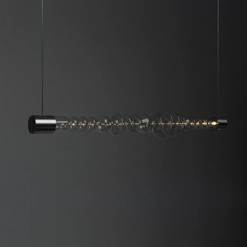 https://cdn.shopify.com/s/files/1/2499/8120/files/lustre-en-verre-design-cr-atif-minimaliste-pour-restaurant-moderne-0.png?v=1728262562