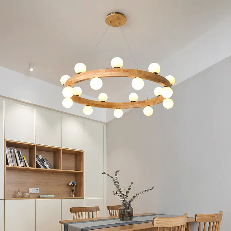 https://cdn.shopify.com/s/files/1/2499/8120/files/iwp-nordic-round-wooden-ring-chandeliers-parlor-log-hanging-lamp-dining-room-kitchen-bedroom-walnut-pendant-lights-with-g9-bulbs-8.jpg?v=1705090058