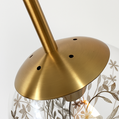 https://cdn.shopify.com/s/files/1/2499/8120/files/applique-design-boule-en-verre-remplie-de-feuilles-dor-es-suspendue-3.png?v=1773459446