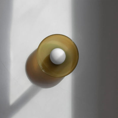 Applique murale en verre dans une chambre