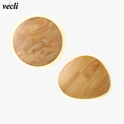 https://cdn.shopify.com/s/files/1/2499/8120/files/applique-murale-led-moderne-en-bois-avec-originalit-nordique-0.png?v=1718457150