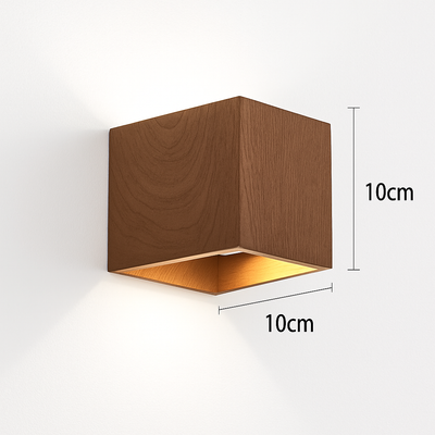 Détail de la finition effet bois de l'applique cube