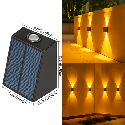 Appliques solaires haut-bas alignées sur un mur de jardin