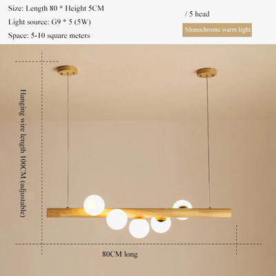https://cdn.shopify.com/s/files/1/2499/8120/files/led-longue-suspension-en-bois-lumi-res-moderne-boule-de-verre-lustre-art-design-luminaire-en-bois-g9-suspension-pour-clairage-de-salle-manger-7.png?v=1708945259