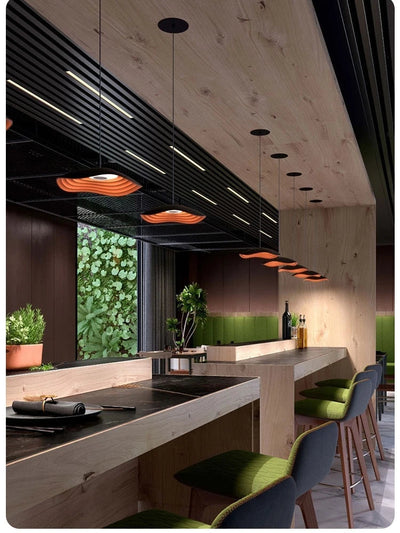 https://cdn.shopify.com/s/files/1/2499/8120/files/lustre-design-en-forme-de-feuille-de-lotus-pour-bar-et-restaurant-1.jpg?v=1731919800