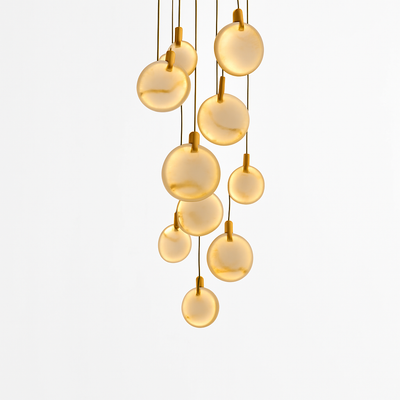 https://cdn.shopify.com/s/files/1/2499/8120/files/lustre-design-en-marbre-dor-avec-clairage-led-tendance-2024-0.png?v=1773252588