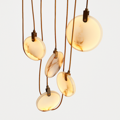 https://cdn.shopify.com/s/files/1/2499/8120/files/lustre-design-en-marbre-dor-avec-clairage-led-tendance-2024-2.png?v=1773252589