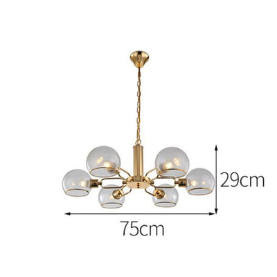 https://cdn.shopify.com/s/files/1/2499/8120/products/lustre-design-moderne-dore-avec-boules-de-verre-glass3.jpg?v=1658142446