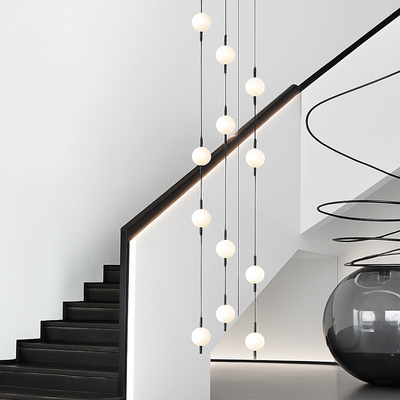 https://cdn.shopify.com/s/files/1/2499/8120/files/lustre-design-moderne-villa-nordique-double-escalier-suspension-2.png?v=1773237426