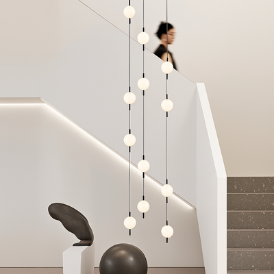 https://cdn.shopify.com/s/files/1/2499/8120/files/lustre-design-moderne-villa-nordique-double-escalier-suspension-5.png?v=1773237426
