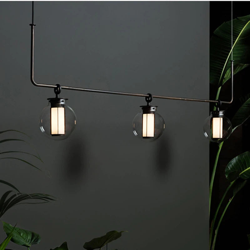 https://cdn.shopify.com/s/files/1/2499/8120/files/lustre-design-postmoderne-en-verre-et-m-tal-clairage-nordique-d-coratif-0.jpg?v=1725699171