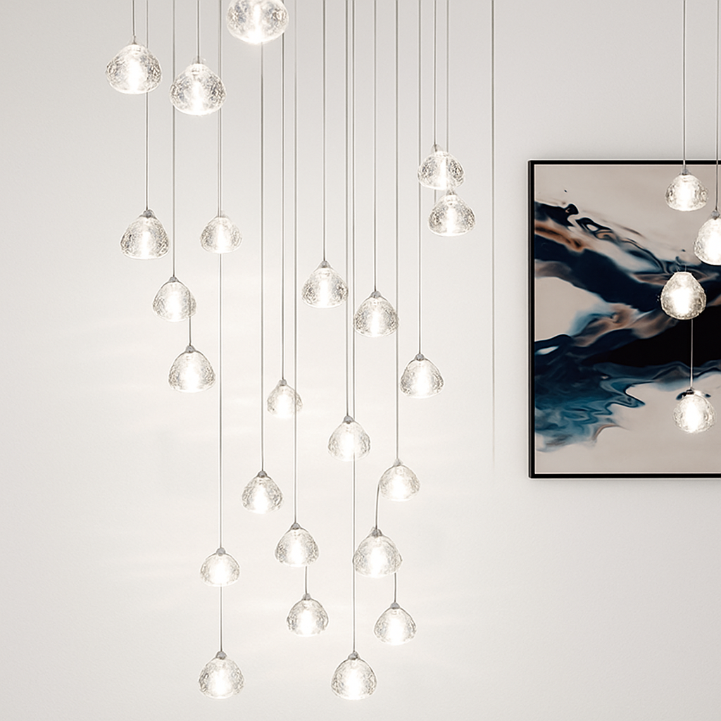 https://cdn.shopify.com/s/files/1/2499/8120/files/lustre-en-cristal-design-luxueux-pour-escalier-colima-on-moderne-0.png?v=1773253002