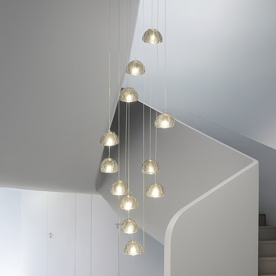 https://cdn.shopify.com/s/files/1/2499/8120/files/lustre-en-cristal-design-luxueux-pour-escalier-colima-on-moderne-2.png?v=1773253002