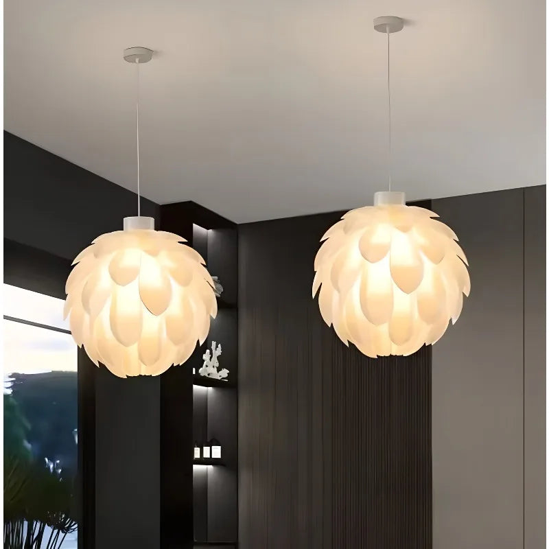 https://cdn.shopify.com/s/files/1/2499/8120/files/lustre-en-pvc-design-pomme-de-pin-moderne-pour-d-coration-int-rieure-0.jpg?v=1735116607