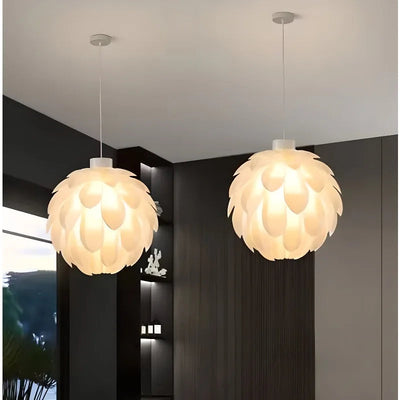 https://cdn.shopify.com/s/files/1/2499/8120/files/lustre-en-pvc-design-pomme-de-pin-moderne-pour-d-coration-int-rieure-0.jpg?v=1735116607