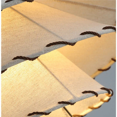 https://cdn.shopify.com/s/files/1/2499/8120/files/lustre-en-tissu-nordique-design-chapeau-de-paille-d-coratif-4.jpg?v=1725670624