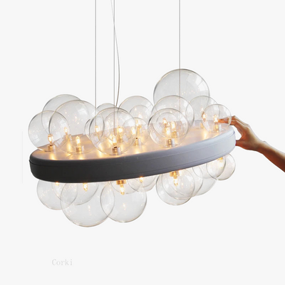 https://cdn.shopify.com/s/files/1/2499/8120/files/lustre-en-verre-transparent-design-moderne-pour-d-coration-int-rieure-5.png?v=1732870284