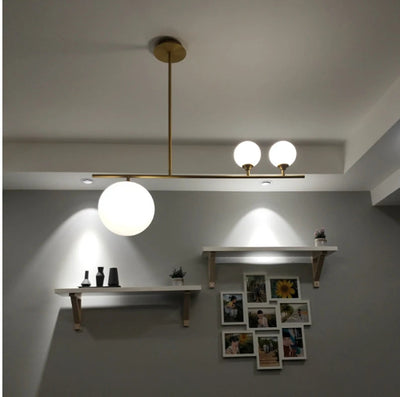 https://cdn.shopify.com/s/files/1/2499/8120/files/lustre-moderne-design-en-verre-pour-d-coration-int-rieure-4.jpg?v=1725699113