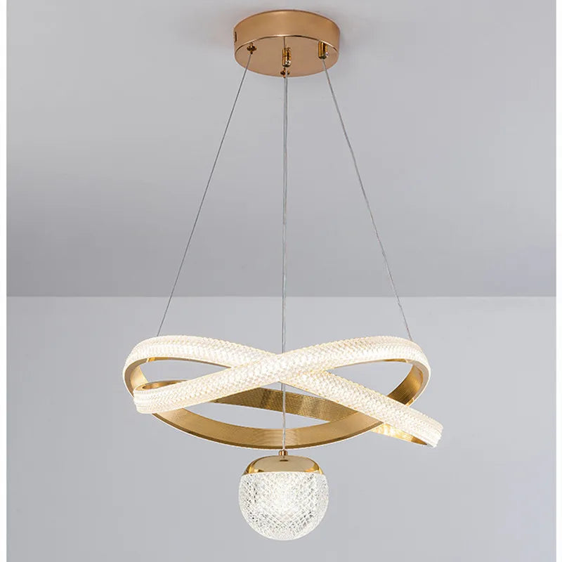 https://cdn.shopify.com/s/files/1/2499/8120/files/lustre-moderne-design-minimaliste-trois-t-tes-l-gant-et-l-ger-0.jpg?v=1728521530