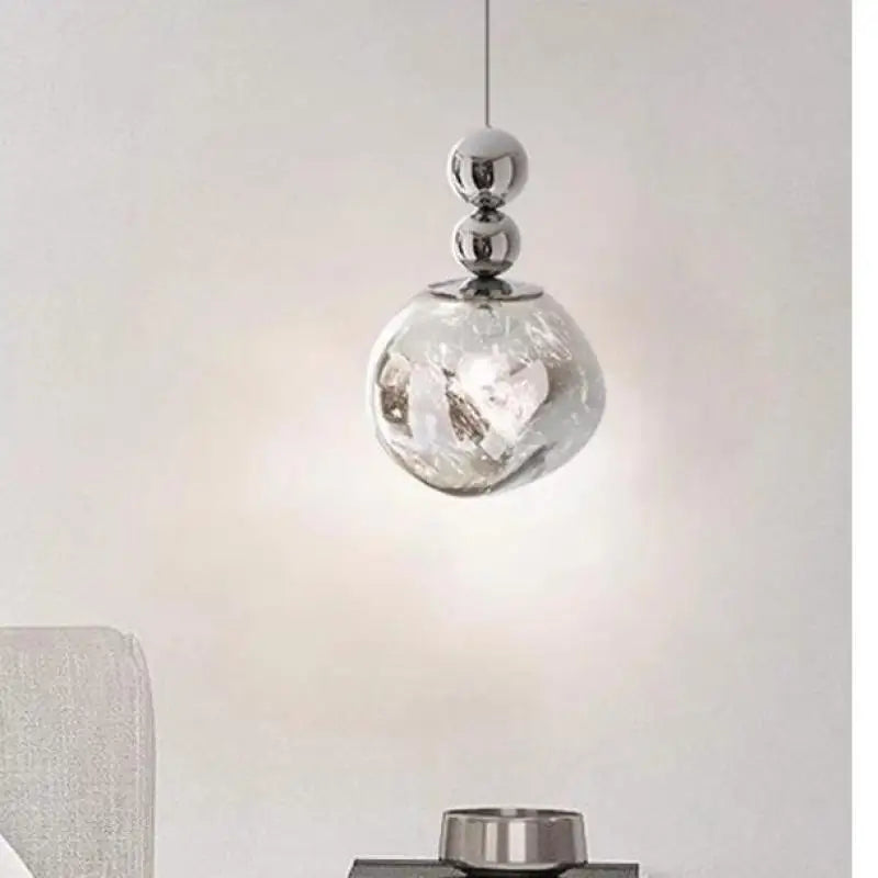 https://cdn.shopify.com/s/files/1/2499/8120/files/lustre-moderne-led-en-cristal-design-nordique-pour-bar-et-salon-0.jpg?v=1736210980