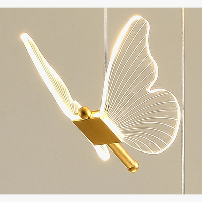 https://cdn.shopify.com/s/files/1/2499/8120/files/lustre-papillon-transparent-design-nordique-suspension-led-5.png?v=1723077679
