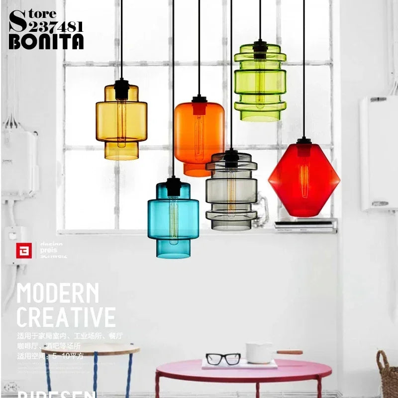 https://cdn.shopify.com/s/files/1/2499/8120/files/lustre-suspendu-moderne-en-verre-transparent-design-l-gant-0.png?v=1728060756