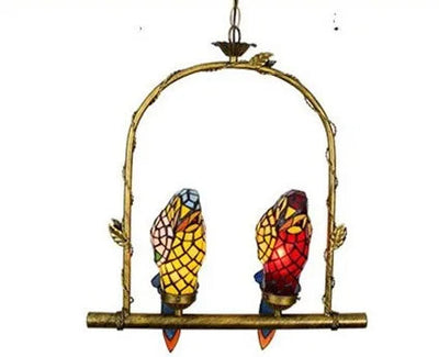 https://cdn.shopify.com/s/files/1/2499/8120/files/lustre-tiffany-vitrail-lumineux-oiseau-perroquet-design-l-gant-int-rieur-6.jpg?v=1729731213