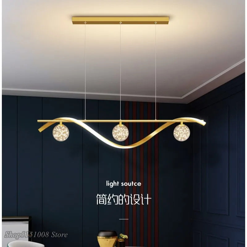 https://cdn.shopify.com/s/files/1/2499/8120/files/personnalit-nordique-moderne-salle-manger-lustre-2021new-lumi-re-luxe-minimaliste-designer-toil-bar-comptoir-led-long-lustre-4.jpg?v=1711889271