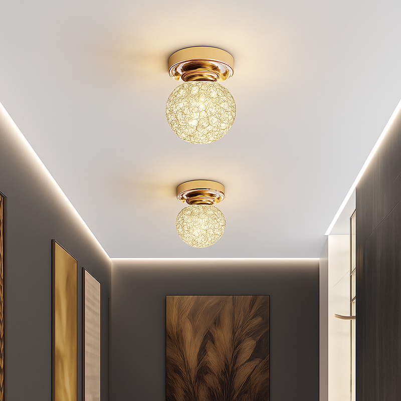 https://cdn.shopify.com/s/files/1/2499/8120/files/plafonnier-design-led-dor-en-cristal-luxury-tourtelle-0.png?v=1773867342