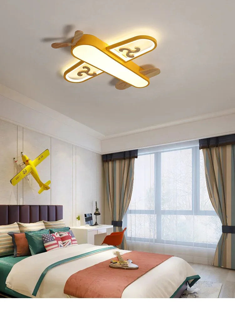 https://cdn.shopify.com/s/files/1/2499/8120/files/plafonnier-led-design-minimaliste-en-bois-forme-avion-pour-enfants-1.jpg?v=1720197679