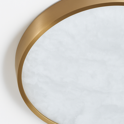 https://cdn.shopify.com/s/files/1/2499/8120/files/plafonnier-led-en-marbre-fin-design-simple-et-moderne-en-cuivre-bross-3.png?v=1773604320