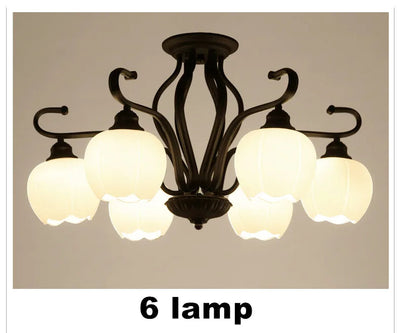https://cdn.shopify.com/s/files/1/2499/8120/files/plafonnier-vintage-en-fer-forg-abat-jour-en-verre-design-l-gant-6.jpg?v=1728867067