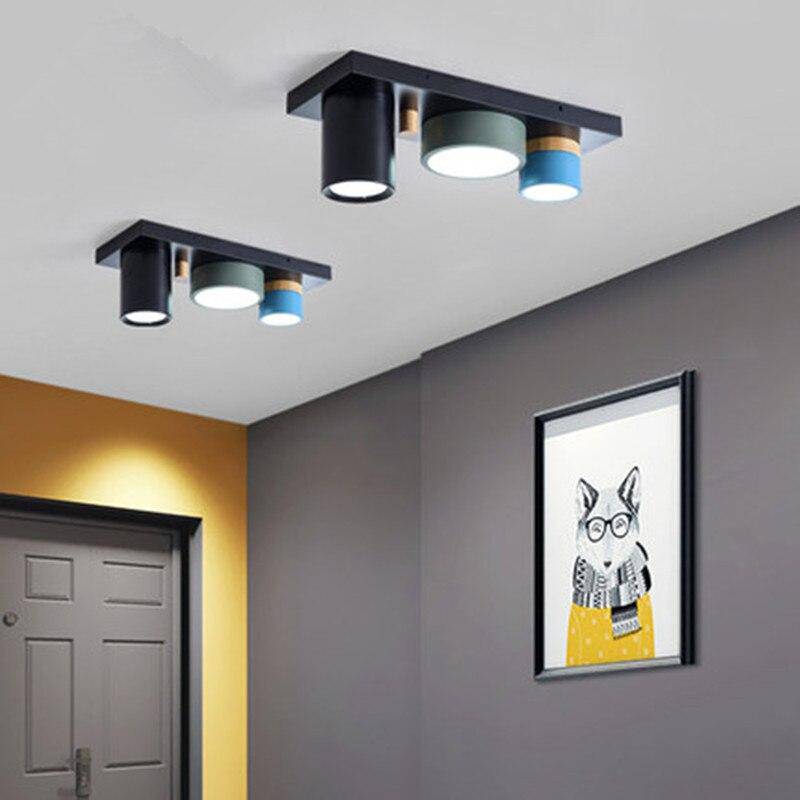 https://cdn.shopify.com/s/files/1/2499/8120/products/plafonnier-design-avec-plusieurs-spots-cylindriques-colores-a-led_ddbc6048-8e6e-472b-aa9c-c140c0c44780.png?v=1632839590