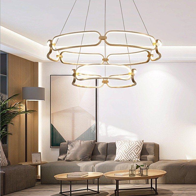 https://cdn.shopify.com/s/files/1/2499/8120/products/lustre-design-a-led-dore-avec-anneaux-pavia.jpg?v=1638873447