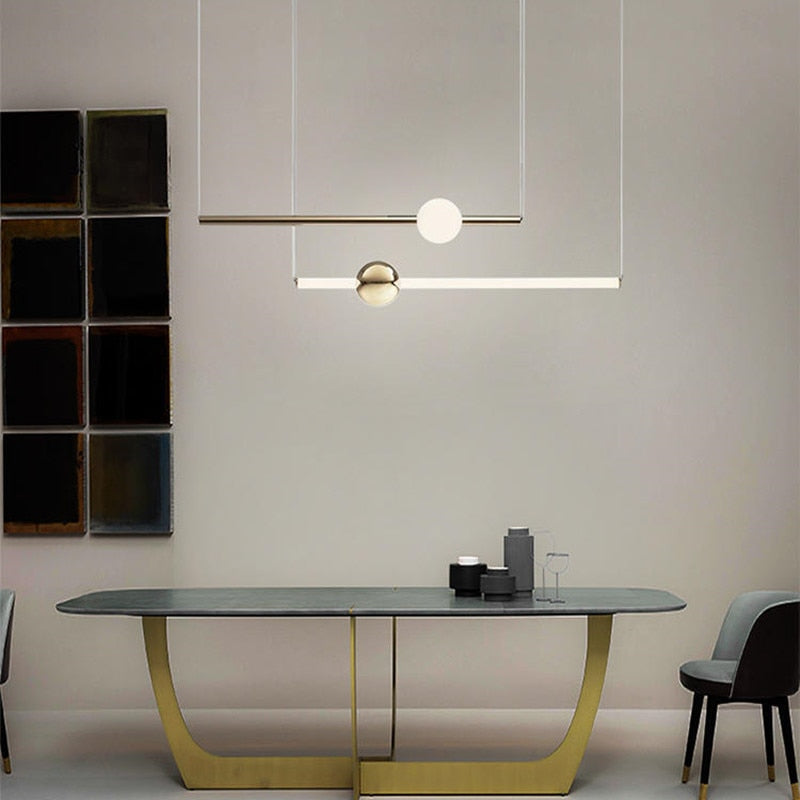 https://cdn.shopify.com/s/files/1/2499/8120/products/lustre-design-en-tubes-dores-a-led-orion.jpg?v=1657535582