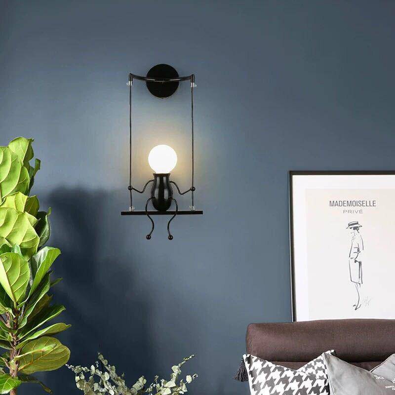 https://cdn.shopify.com/s/files/1/2499/8120/products/applique-murale-led-bonhomme-sur-balancoire-decoration_1600x_fb16caec-6fb6-40d4-9d4b-5bb6714d69ab.png?v=1632835744