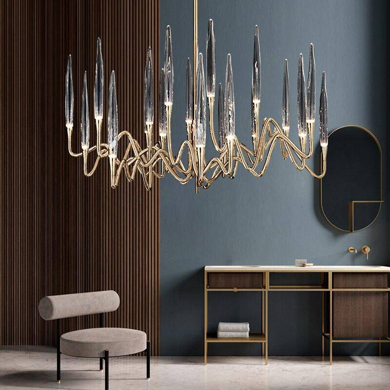 https://cdn.shopify.com/s/files/1/2499/8120/products/lustre-design-led-avec-tiges-dorees-et-verre-style-hotel_a4dbc359-d7d7-4853-ab77-0eb8e4a99dc6.png?v=1632848278