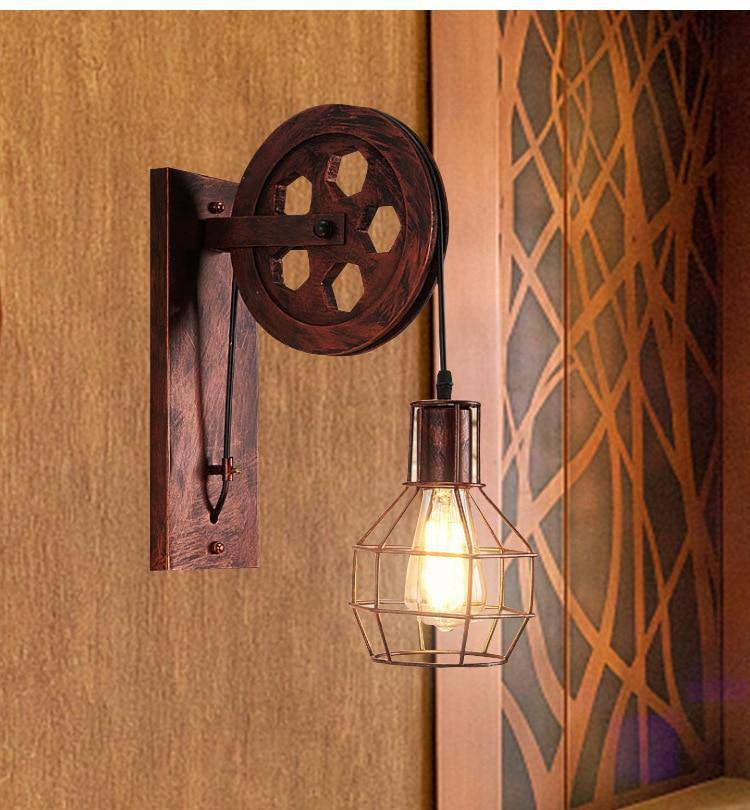 https://cdn.shopify.com/s/files/1/2499/8120/products/applique-murale-rustique-poulie-avec-cage-industrielle_1600x_015e7051-bd8b-4576-b17b-12603808d013.jpg?v=1632836991