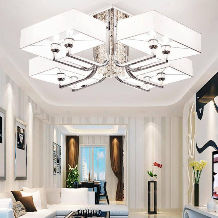 https://cdn.shopify.com/s/files/1/2499/8120/products/lustre-design-chrome-en-cristal-et-verre-avec-grand-abat-jour-luxe_ebe20d66-b845-4fdd-8349-8ea936340009.jpg?v=1632785686